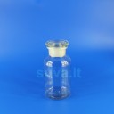 Plačiakaklis, skaidraus stiklo buteliukas su pritrintu kamščiu (500 ml)